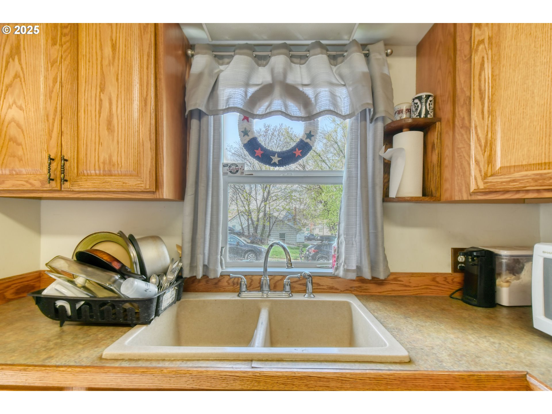 912 Southwest Goodwin Place Pendleton, OR 97801 - Photo 16 of 37 a kitchen with a sink and a window