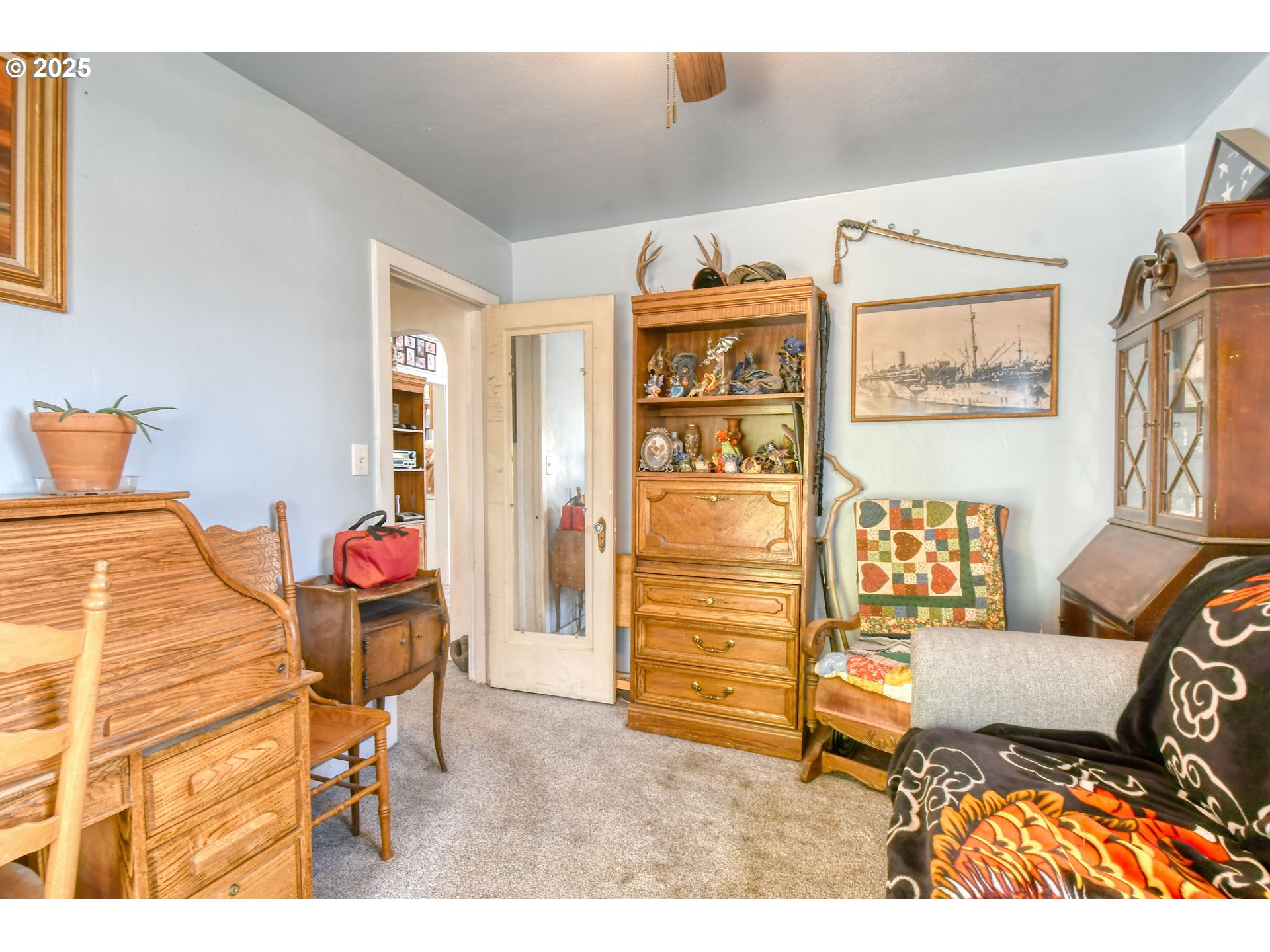 912 Southwest Goodwin Place Pendleton, OR 97801 - Photo 22 of 37 a bed room with a bed and a chair