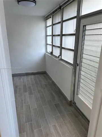 a view of small space with racks on the wall