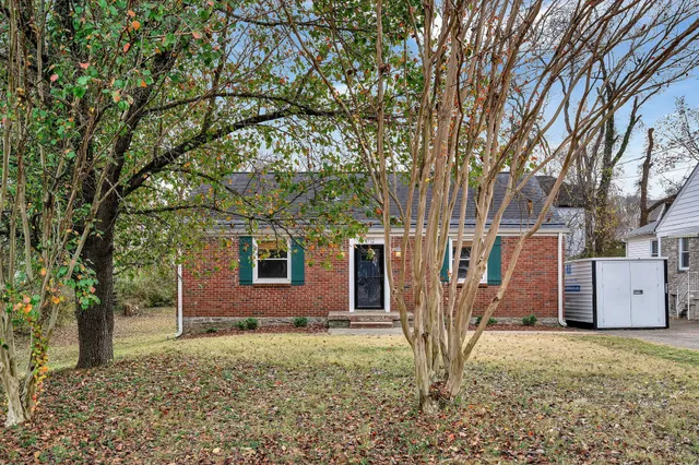 a house view with a backyard space