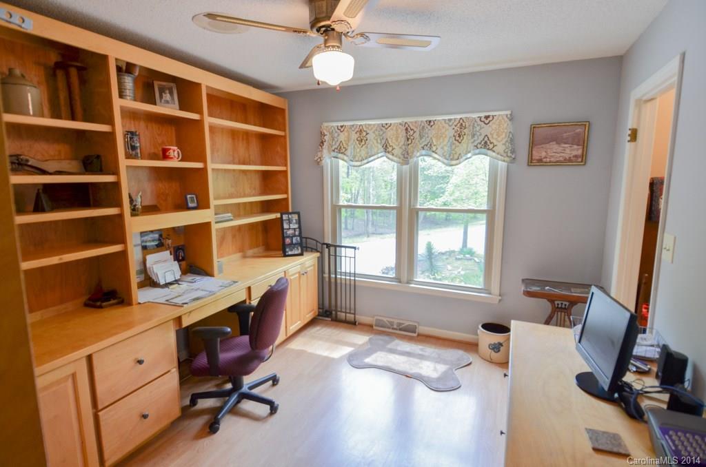 810 Old Williams Road Wingate, NC 28174 - Photo 14 of 24 a workspace with furniture and a window
