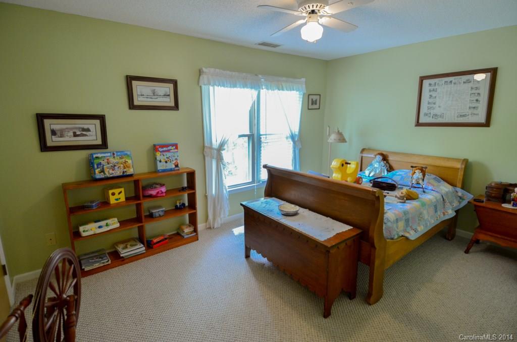 810 Old Williams Road Wingate, NC 28174 - Photo 17 of 24 a bedroom with bed and a window