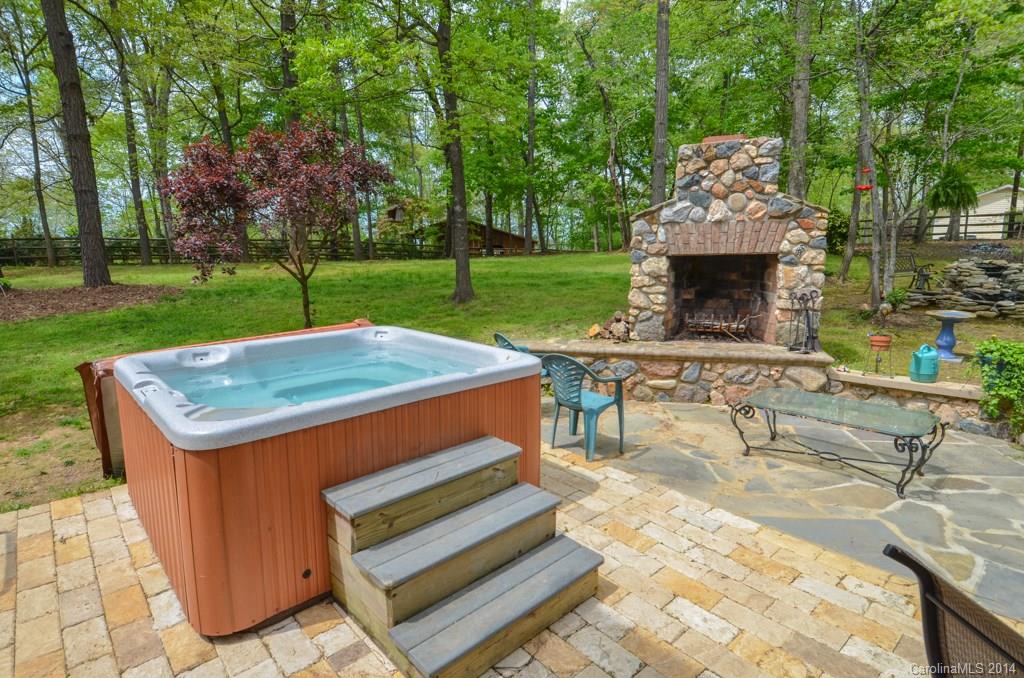 810 Old Williams Road Wingate, NC 28174 - Photo 6 of 24 a view of a patio with a table and chairs