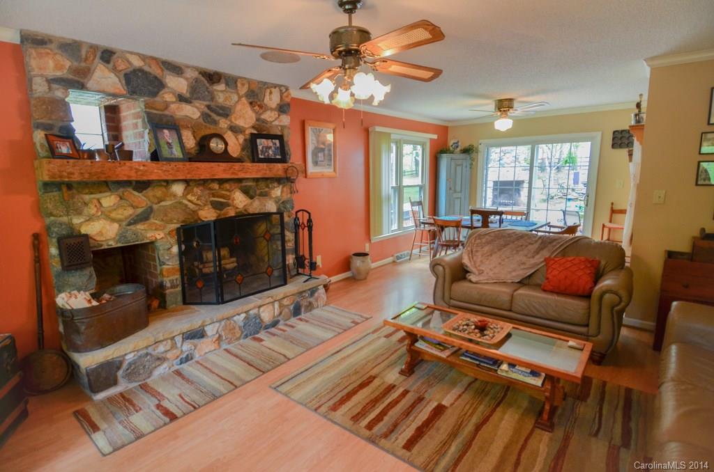 810 Old Williams Road Wingate, NC 28174 - Photo 8 of 24 a living room with furniture and a fireplace
