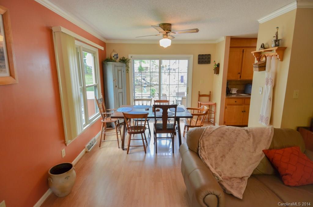 810 Old Williams Road Wingate, NC 28174 - Photo 10 of 24 a living room with furniture and a large window