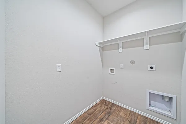 a view of a room with racks on the wall