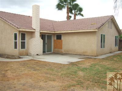 44313 Larrea Street Indio, CA 92201 - Photo 2 of 10 a view of house with backyard and space