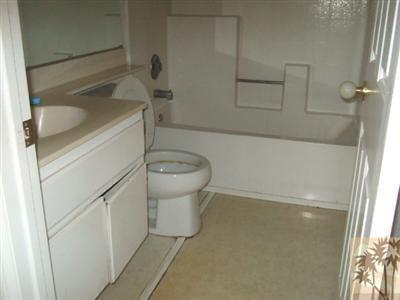 44313 Larrea Street Indio, CA 92201 - Photo 6 of 10 a bathroom with a sink and toilet