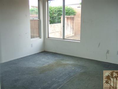 44313 Larrea Street Indio, CA 92201 - Photo 9 of 10 an empty room with a window