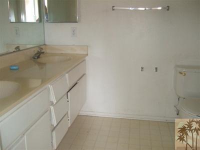 44313 Larrea Street Indio, CA 92201 - Photo 10 of 10 a bathroom with a sink and a mirror