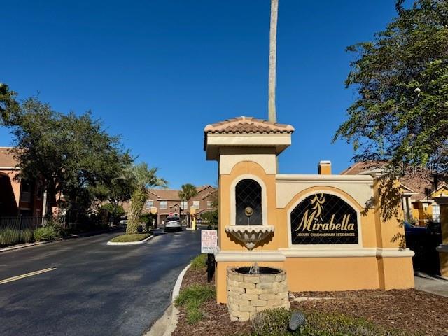 8842 Villa View Circle, Unit 108 Orlando, FL 32821 - Photo 15 of 25 a front view of a house with parking space