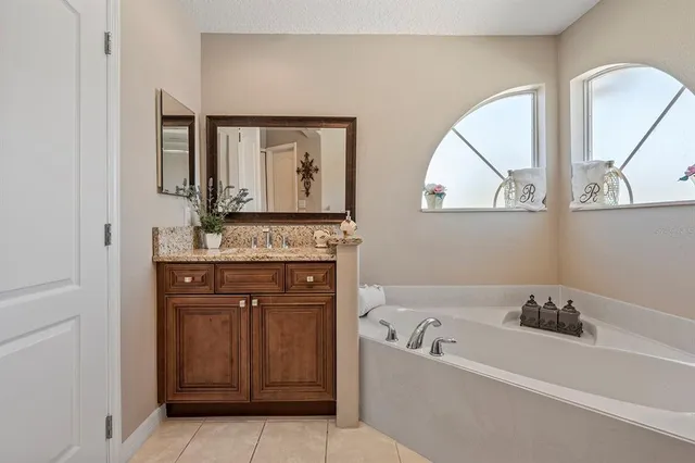 a view of a lake with a yard