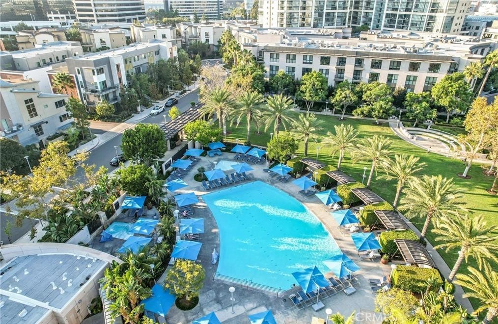 3608 Rivington Irvine, CA 92612 - Photo 41 of 74 a view of a multi story residential apartment building with a yard