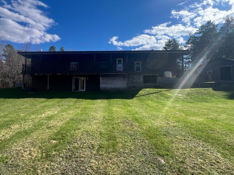 243 County Rte 14 St. Regis Falls, NY 12980 - Photo 4 of 55 Back