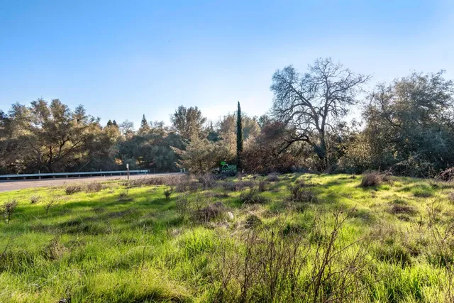 a view of a swimming pool with an outdoor space and seating area