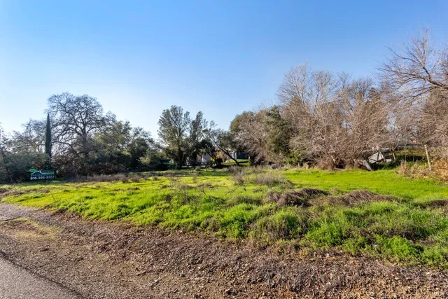 a view of a swimming pool with an outdoor space and seating area