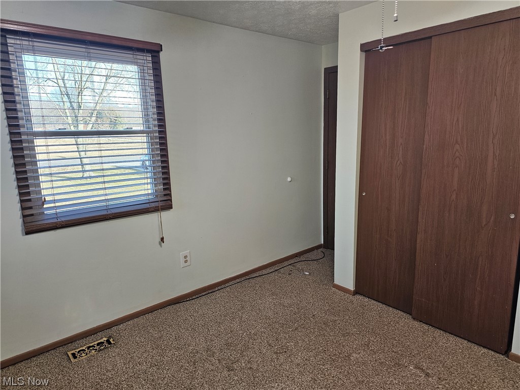 4873 Industry Road Ravenna, OH 44266 - Photo 14 of 27 Master Bedroom with Entry to Full Bath