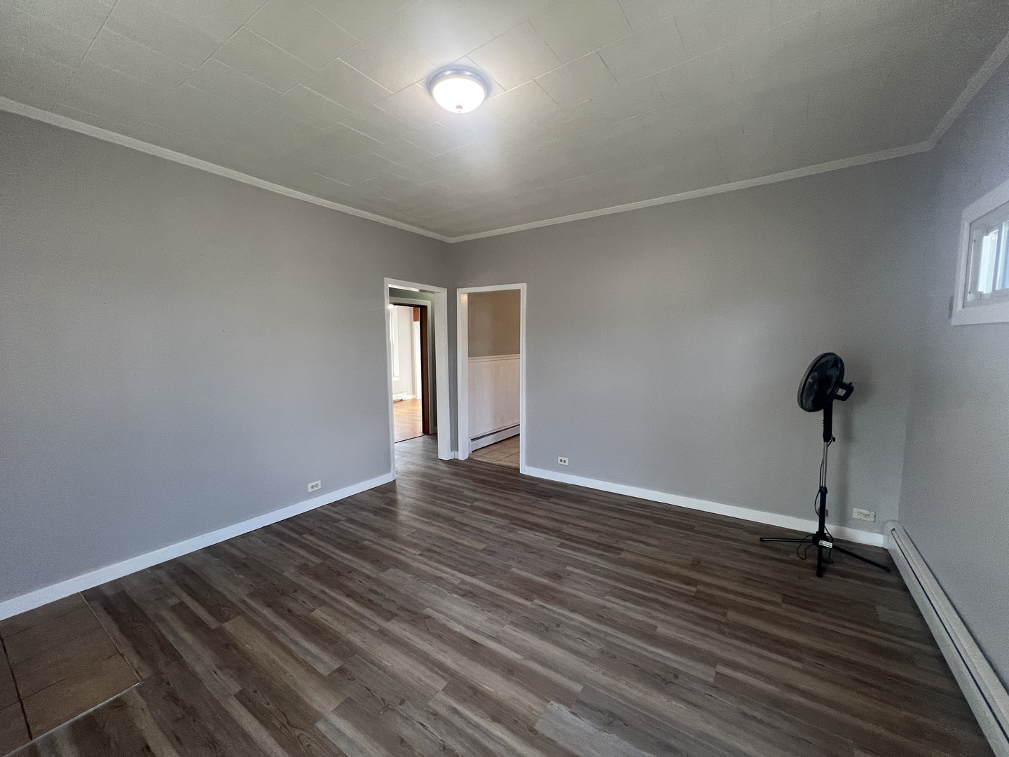 1109 West Adams Street Herrin, IL 62948 - Photo 11 of 27 a view of an empty room with a window