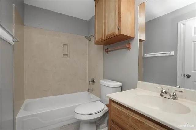 a view of a cars park in front of house