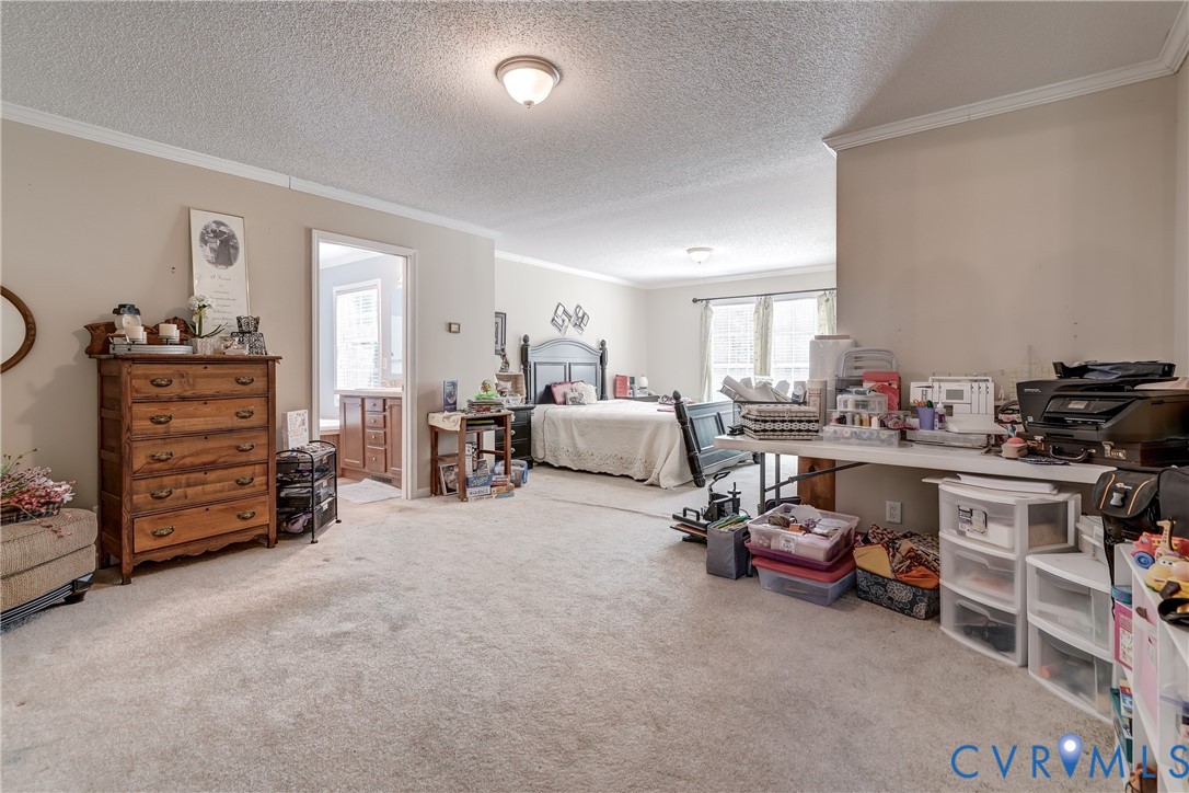 8025 Colemans Lake Road Church Road, VA 23850 - Photo 13 of 21 a room with furniture and a flat screen tv