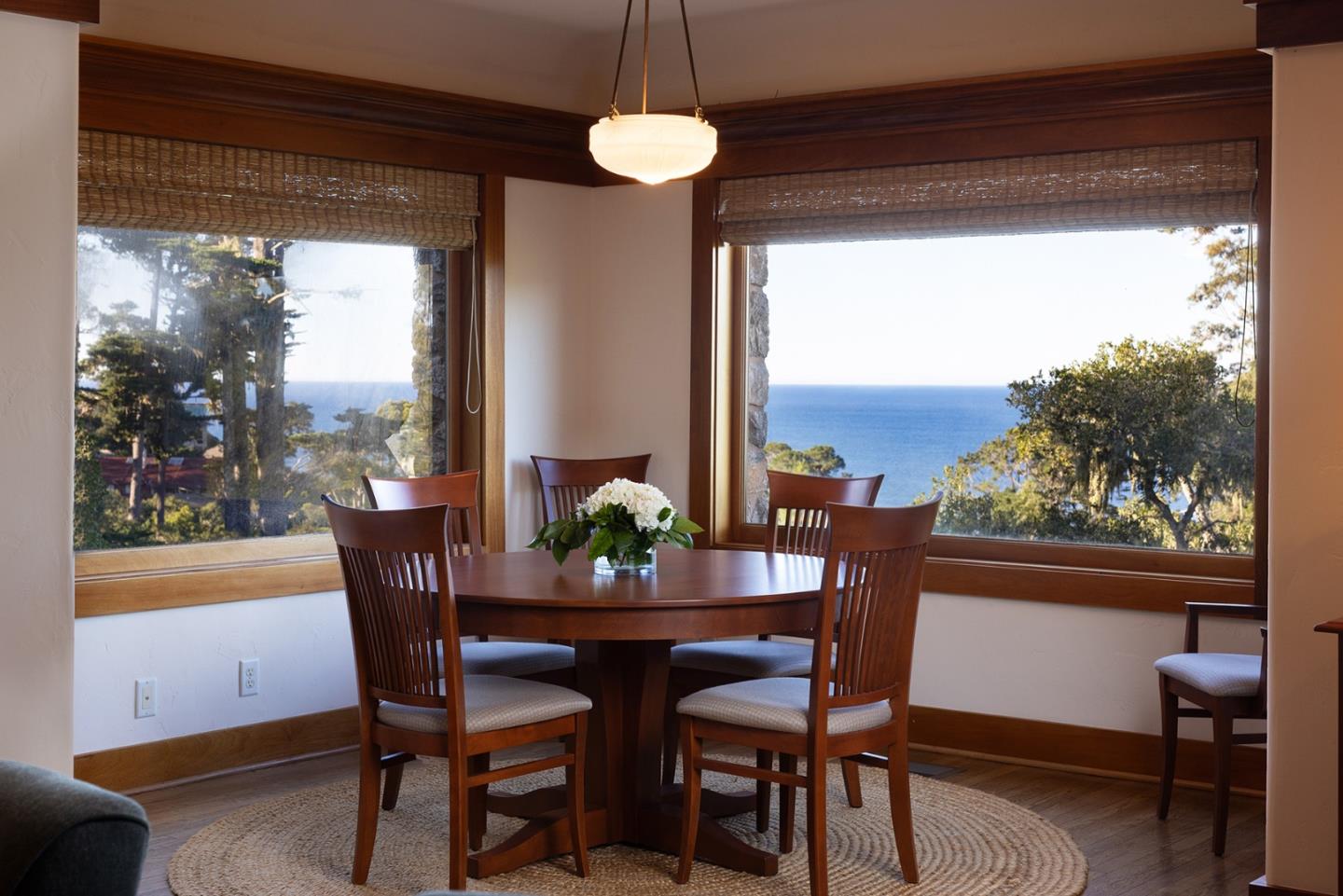 72 Fern Canyon Road Carmel, CA 93923 - Photo 44 of 66 a view of a dining room with furniture window and wooden floor