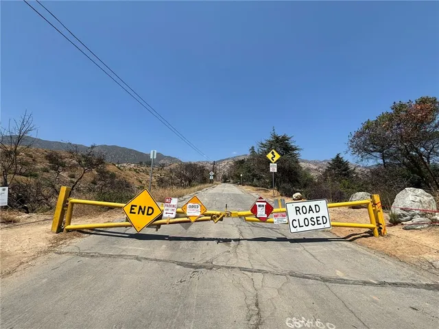 a view of snow on the side of road