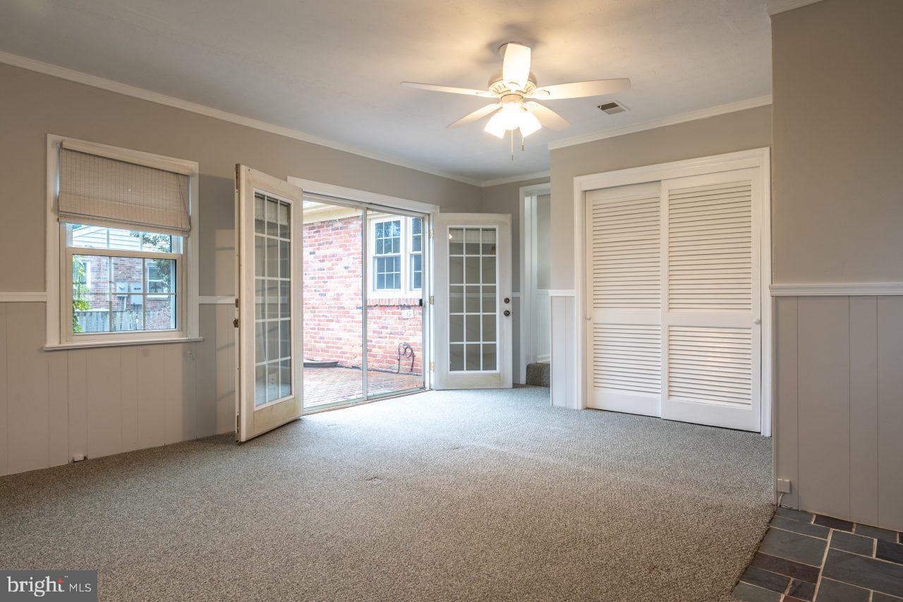 7924 Wellington Road Alexandria, VA 22308 - Photo 18 of 35 French doors open to private brick patio