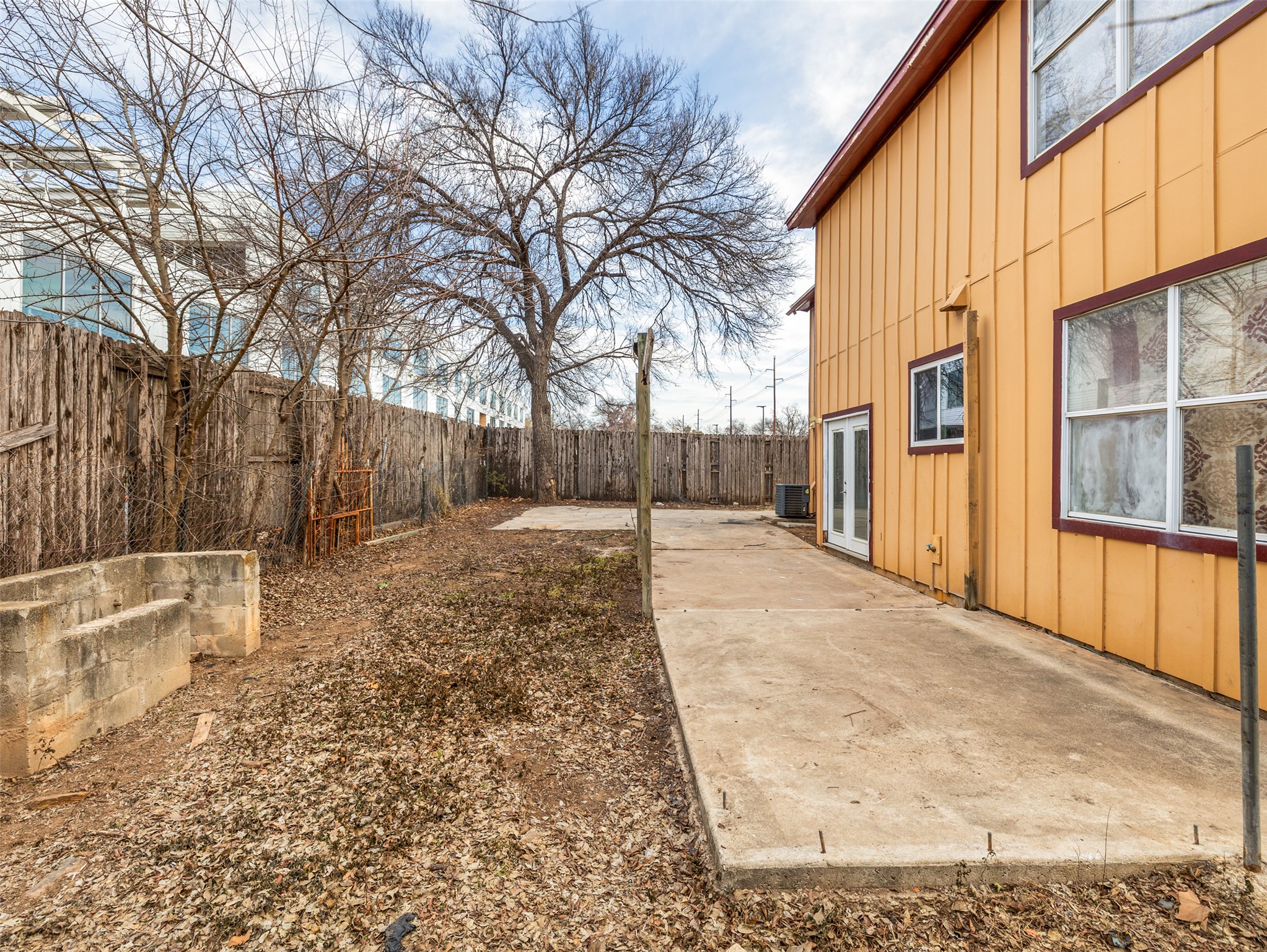 506 Tillery Street Austin, TX 78702 - Photo 20 of 27 Fenced backyard featuring a patio area