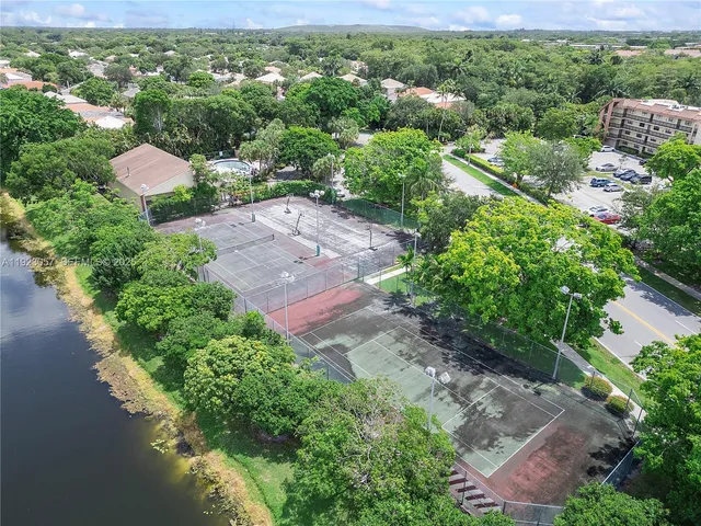 a view of a lot of trees and houses in a yard