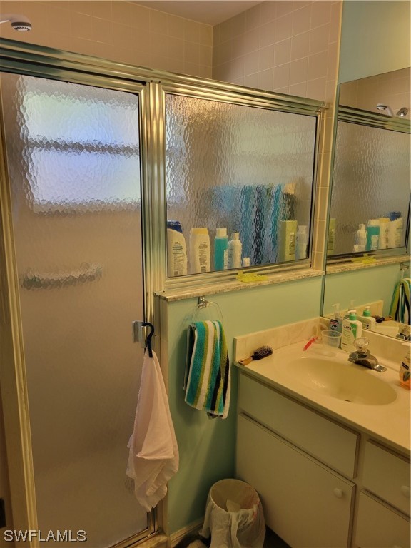 10720 Blue Bimini Circle Estero, FL 33928 - Photo 13 of 28 a bathroom with a sink and a mirror