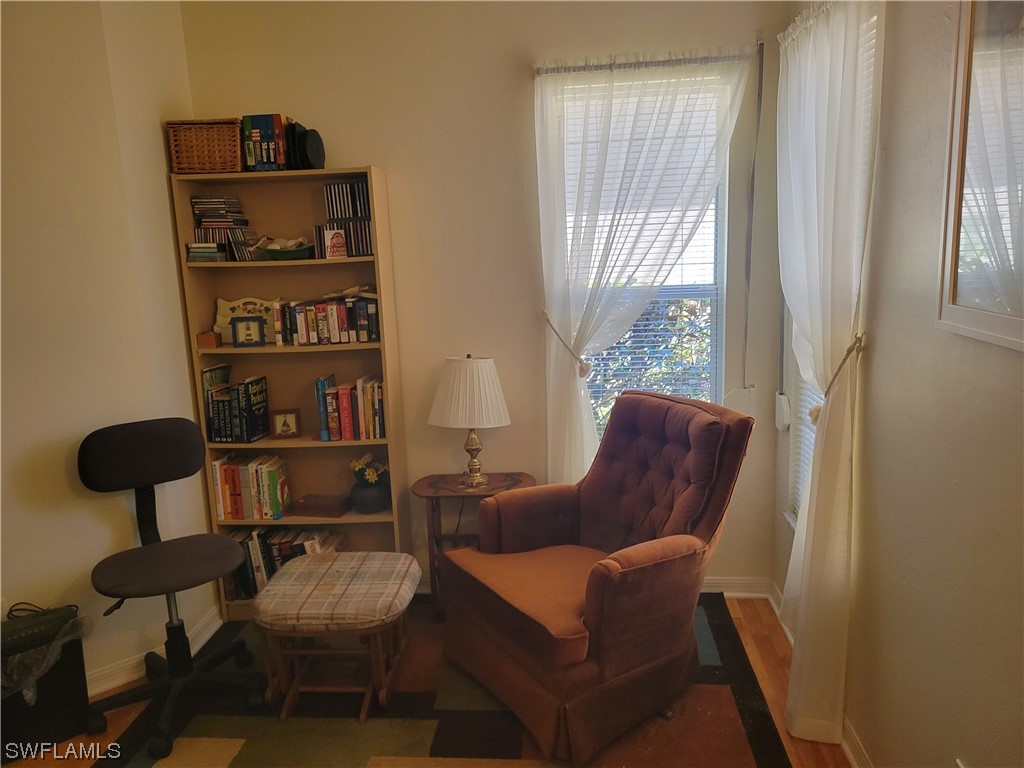 10720 Blue Bimini Circle Estero, FL 33928 - Photo 17 of 28 a living room with furniture and a window