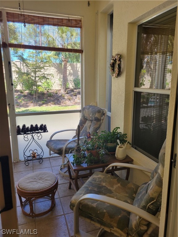 10720 Blue Bimini Circle Estero, FL 33928 - Photo 22 of 28 a living room with furniture and a window
