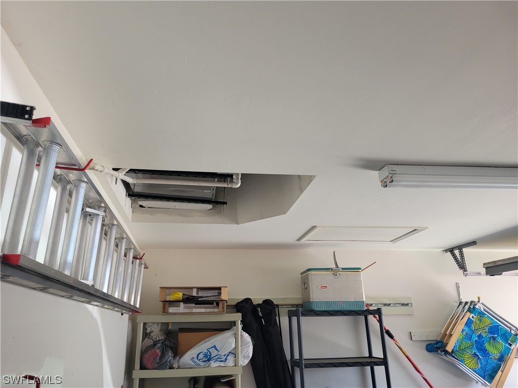 10720 Blue Bimini Circle Estero, FL 33928 - Photo 28 of 28 a view of storage and utility room