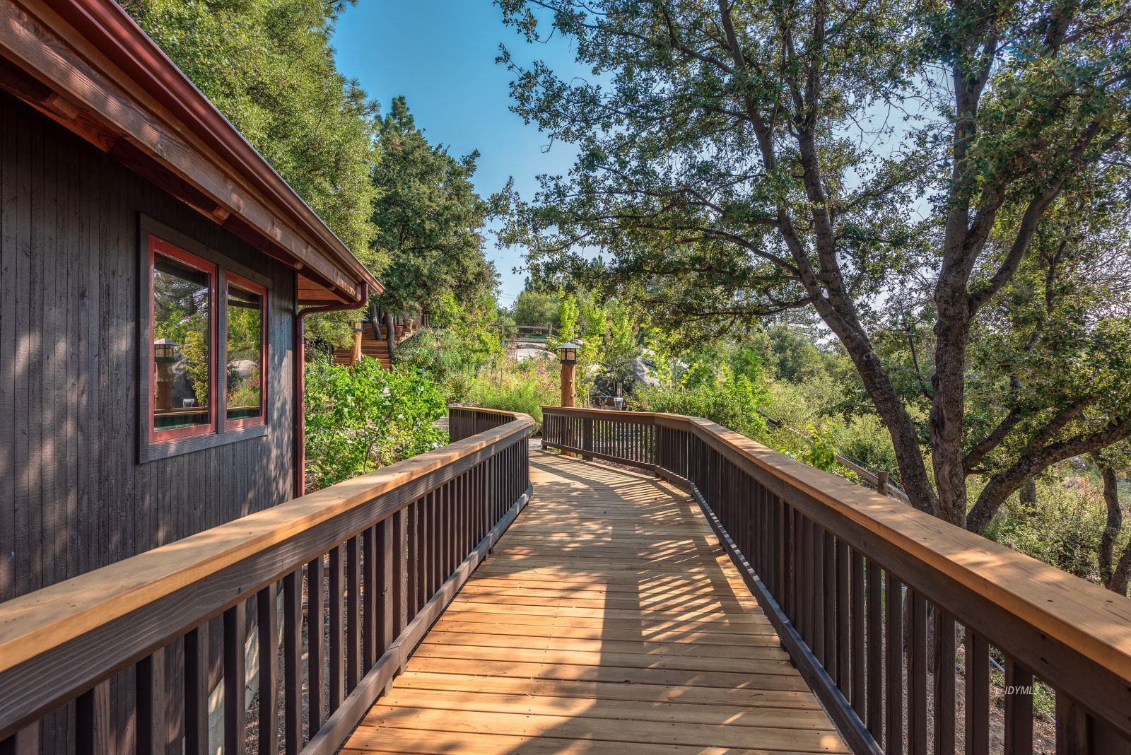 52430 Double View Drive Idyllwild, CA 92549 - Photo 29 of 75 a view of balcony with wooden floor and outdoor seating
