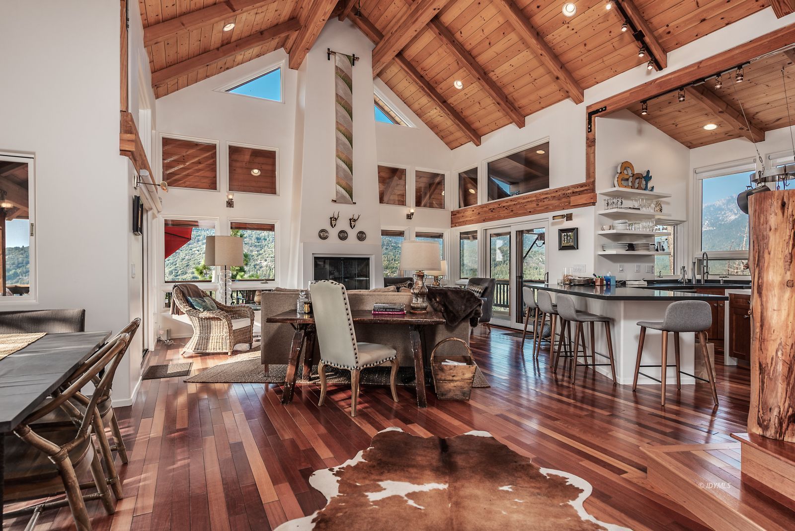 52430 Double View Drive Idyllwild, CA 92549 - Photo 44 of 75 a view of a dining room with furniture and wooden floor