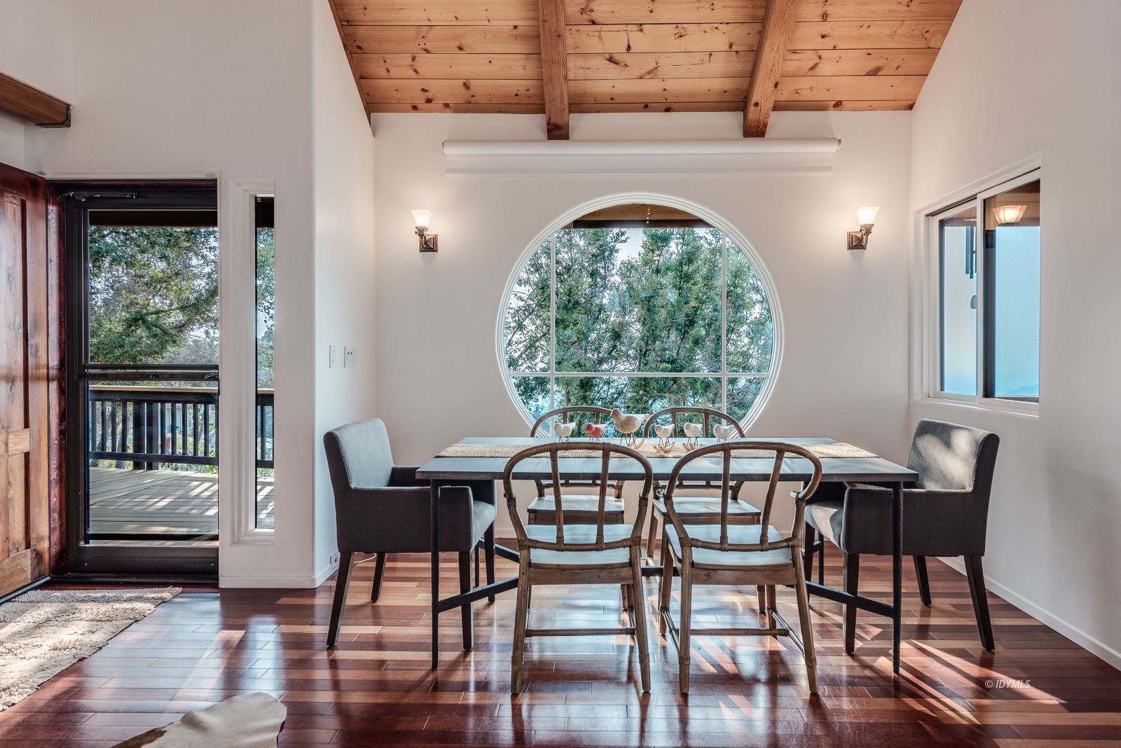 52430 Double View Drive Idyllwild, CA 92549 - Photo 47 of 75 a view of a dining room with furniture window and wooden floor