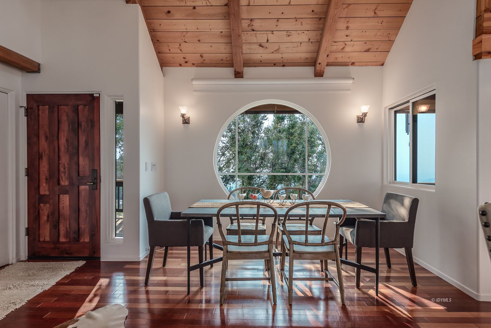 52430 Double View Drive Idyllwild, CA 92549 - Photo 48 of 75 a view of a dining room with furniture window and wooden floor