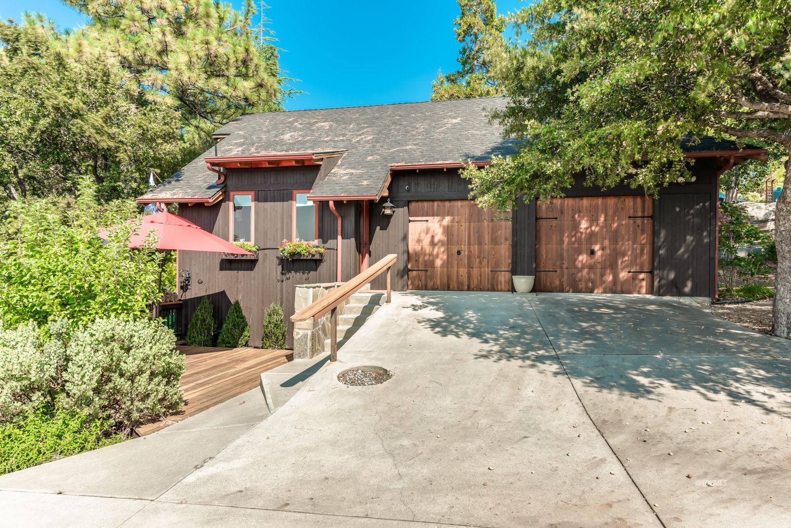 52430 Double View Drive Idyllwild, CA 92549 - Photo 6 of 75 a front view of a house with a yard and garage