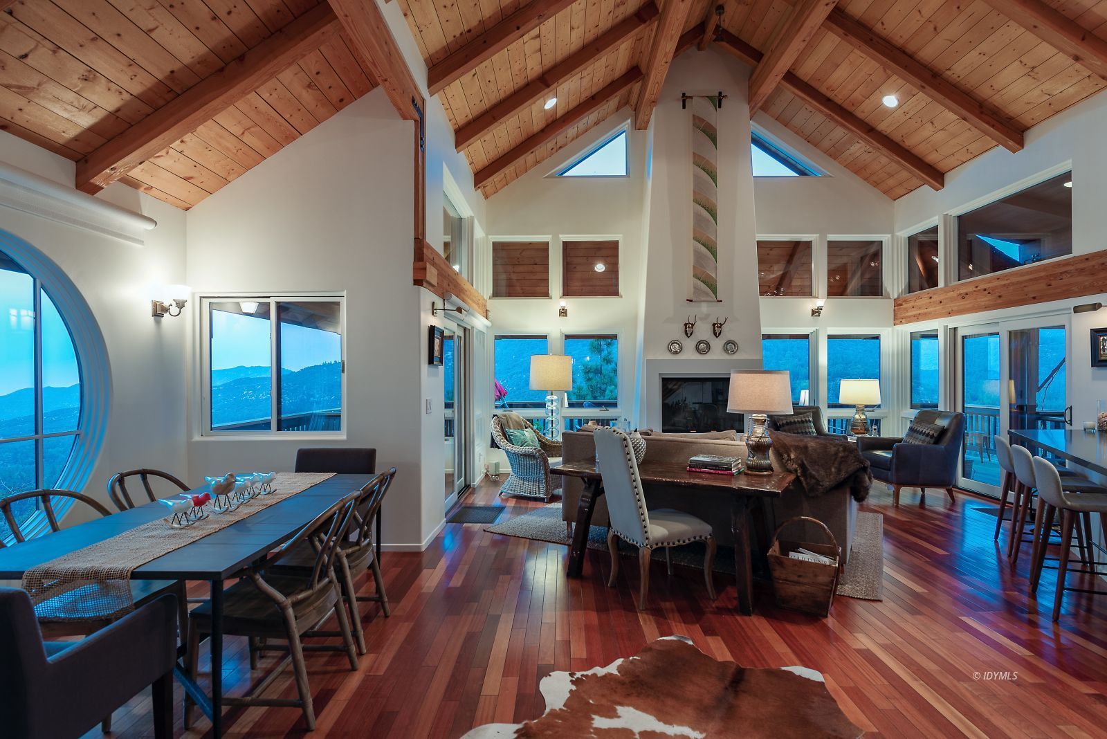 52430 Double View Drive Idyllwild, CA 92549 - Photo 67 of 75 a view of a dining room with furniture window and wooden floor