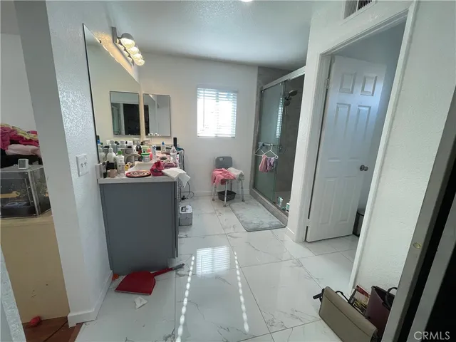 a living room with a couch and a flat screen tv