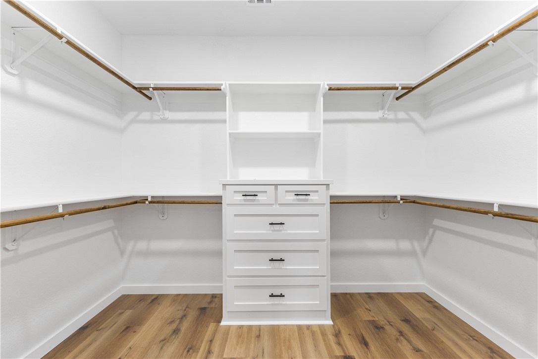 308 Crye Circle Winters, TX 79567 - Photo 26 of 44 a view of walk in closet with empty racks