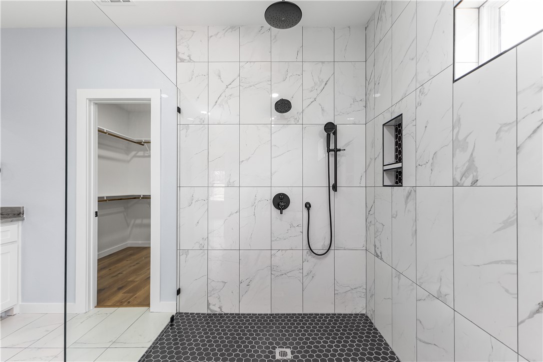 308 Crye Circle Winters, TX 79567 - Photo 27 of 44 a bathroom with a shower