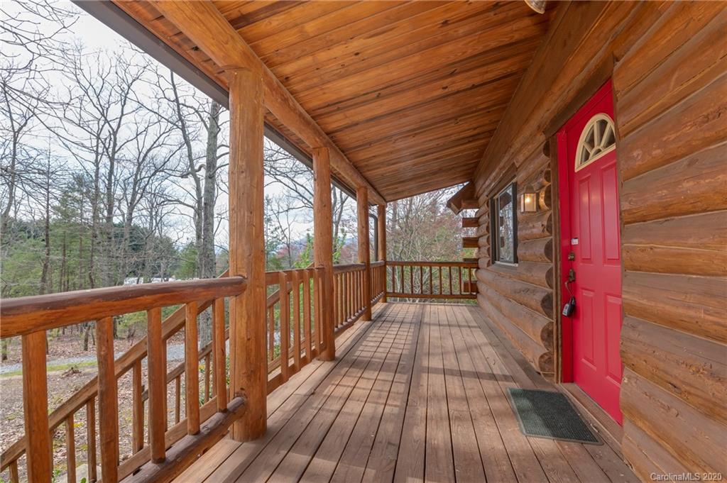83 Luther Durham Road Tryon, NC 28782 - Photo 20 of 43 a view of balcony with wooden floor and outdoor space