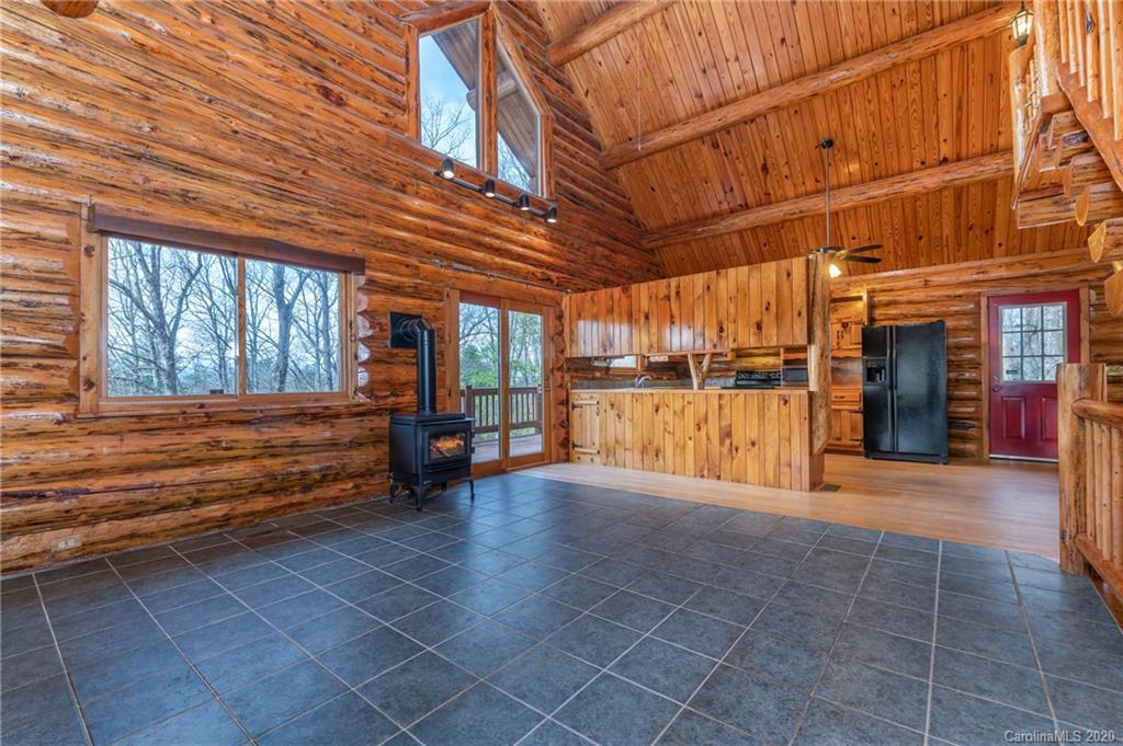 83 Luther Durham Road Tryon, NC 28782 - Photo 21 of 43 a view of front door with outdoor seating