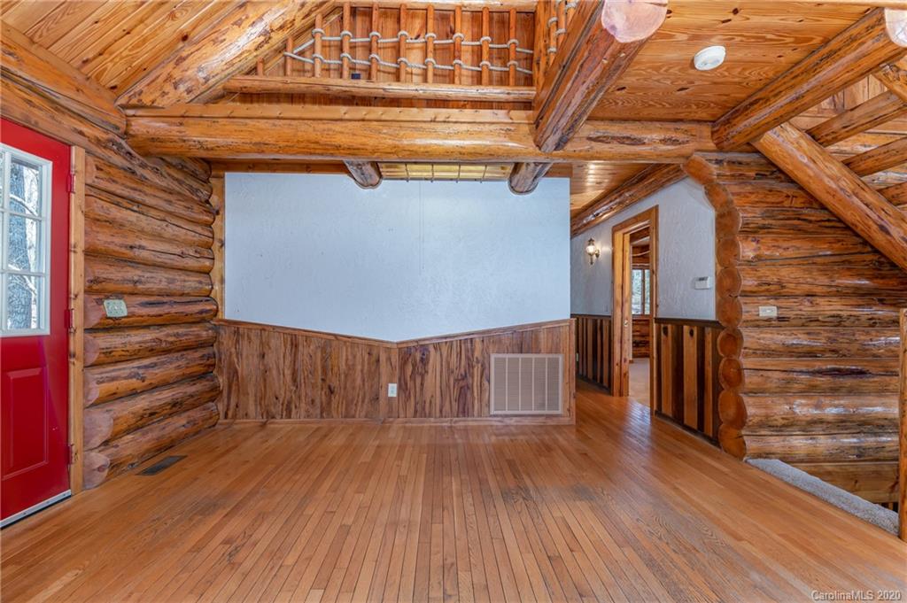 83 Luther Durham Road Tryon, NC 28782 - Photo 27 of 43 a view of entryway with wooden floor