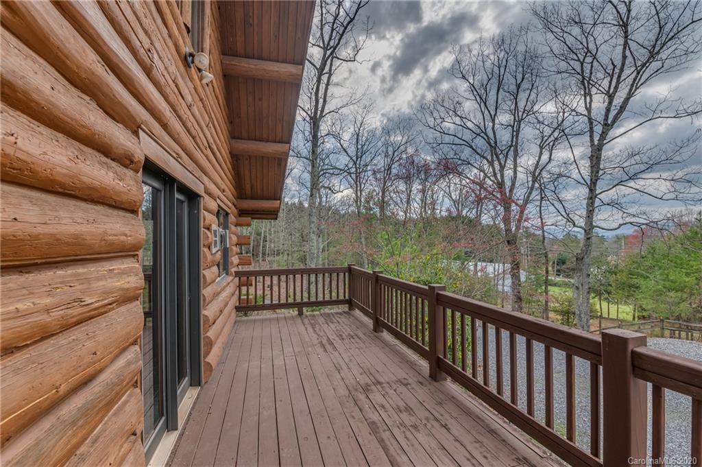 83 Luther Durham Road Tryon, NC 28782 - Photo 42 of 43 a view of a balcony with wooden floor