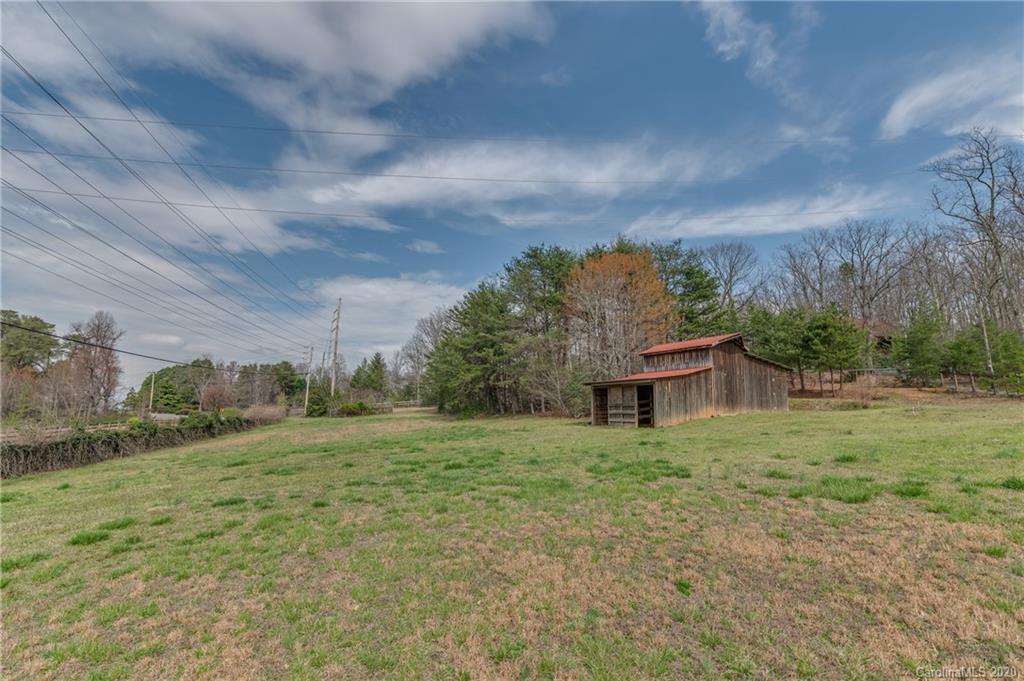 83 Luther Durham Road Tryon, NC 28782 - Photo 9 of 43 a big yard with lots of green space