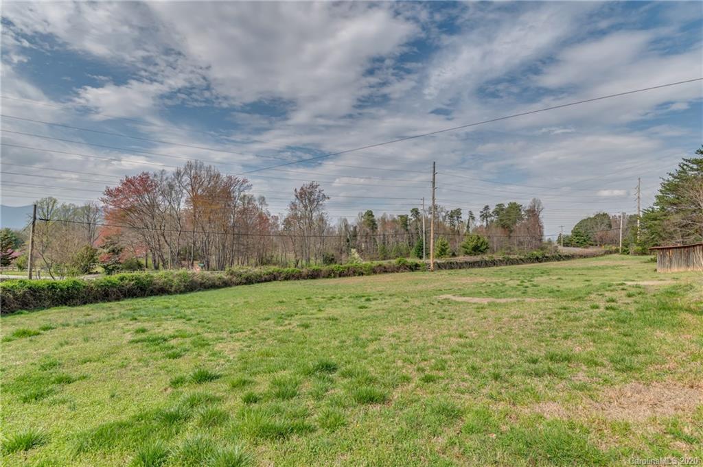 83 Luther Durham Road Tryon, NC 28782 - Photo 10 of 43 a view of a green field