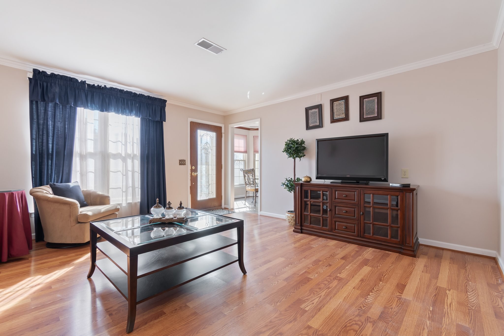 1359 General George Patton Road Nashville, TN 37221 - Photo 21 of 41 a living room with furniture and a flat screen tv