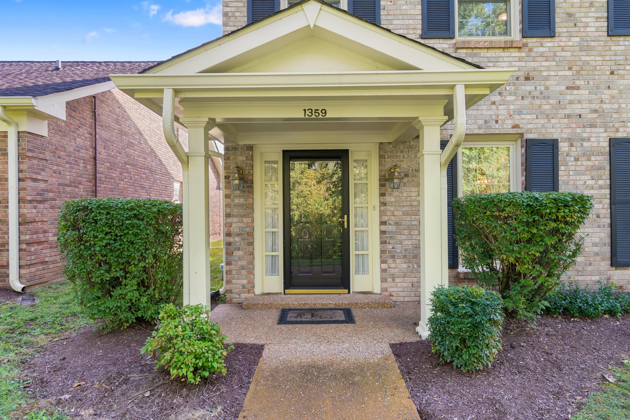 1359 General George Patton Road Nashville, TN 37221 - Photo 3 of 41 a front view of a house with garden